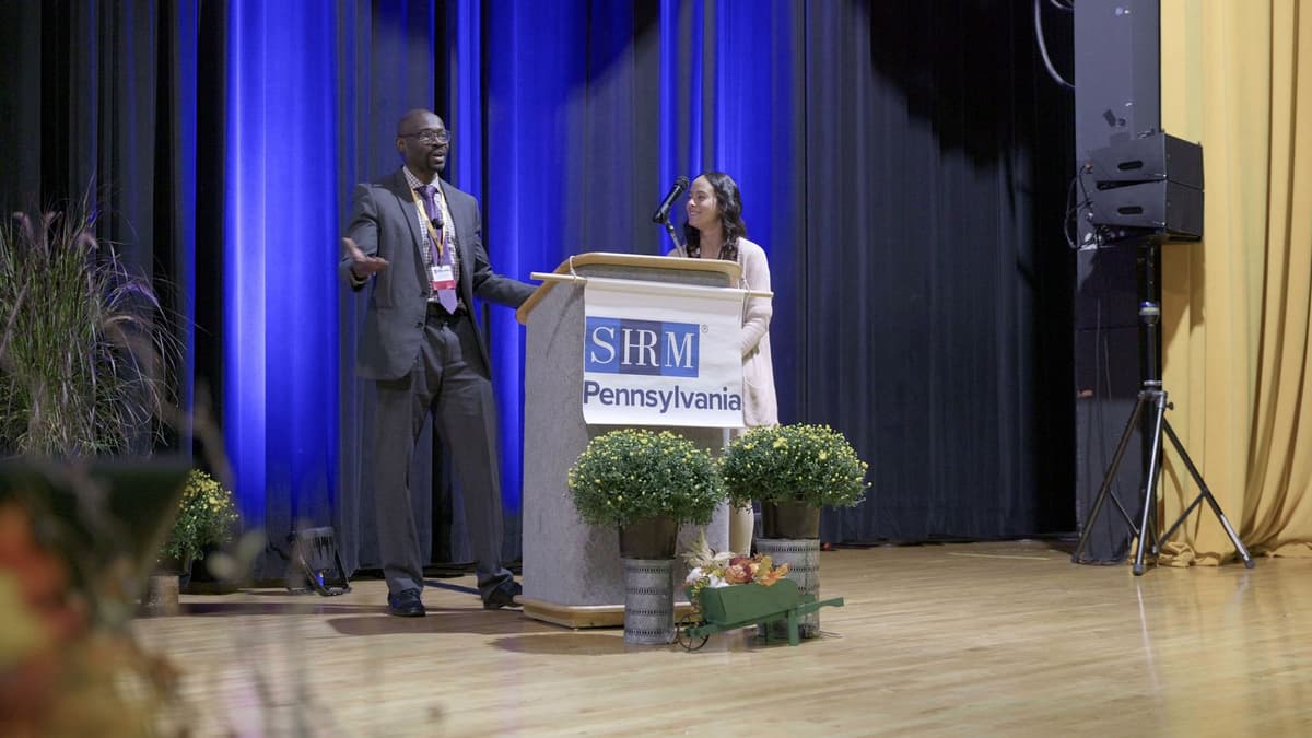 A live AI build on stage with an HR volunteer at PA SHRM 2026